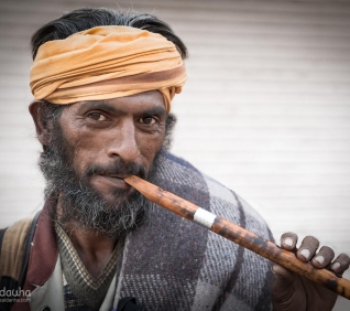 Man playing music, Pushkar, India